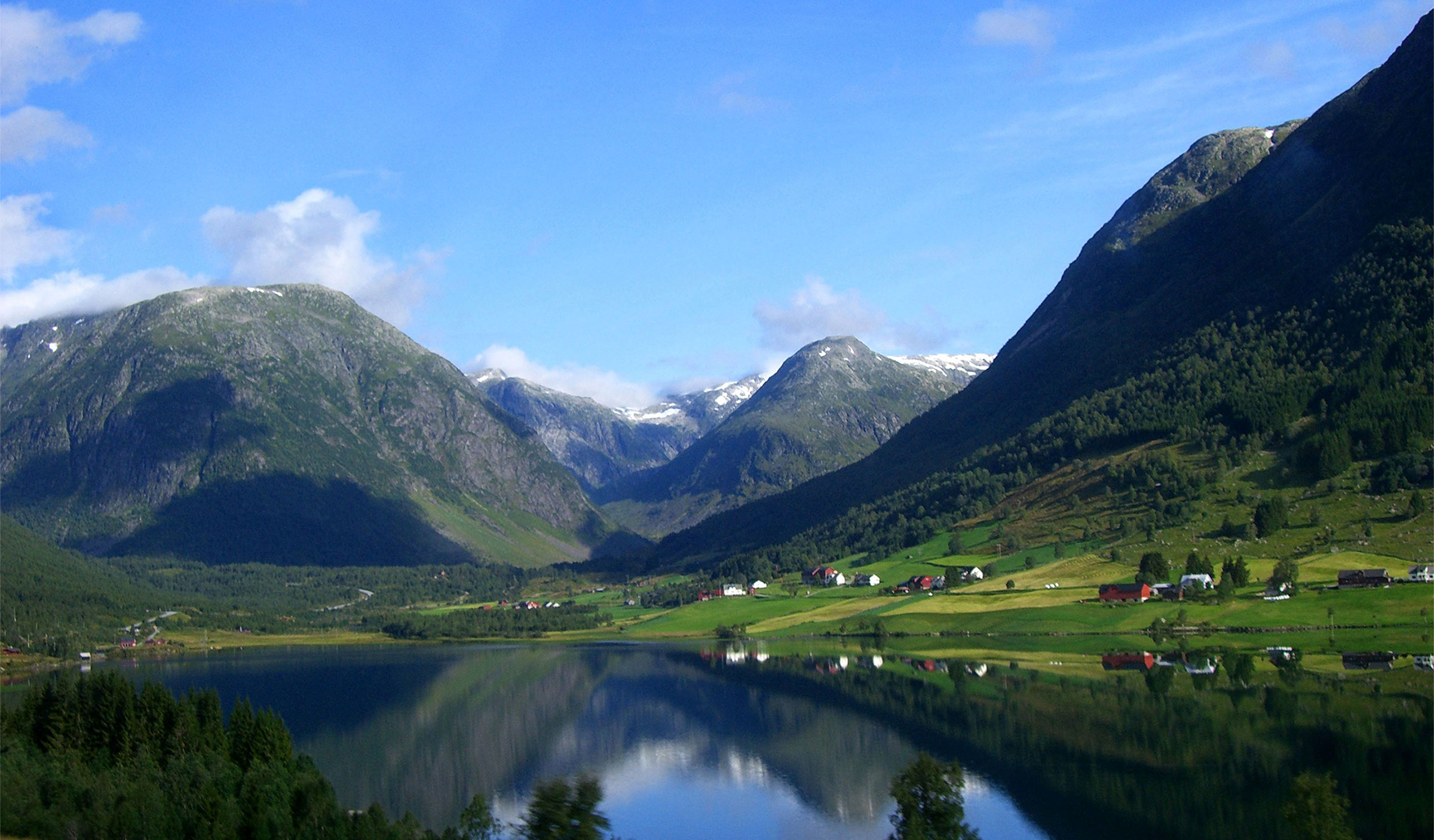 Mountains reflected in lake.